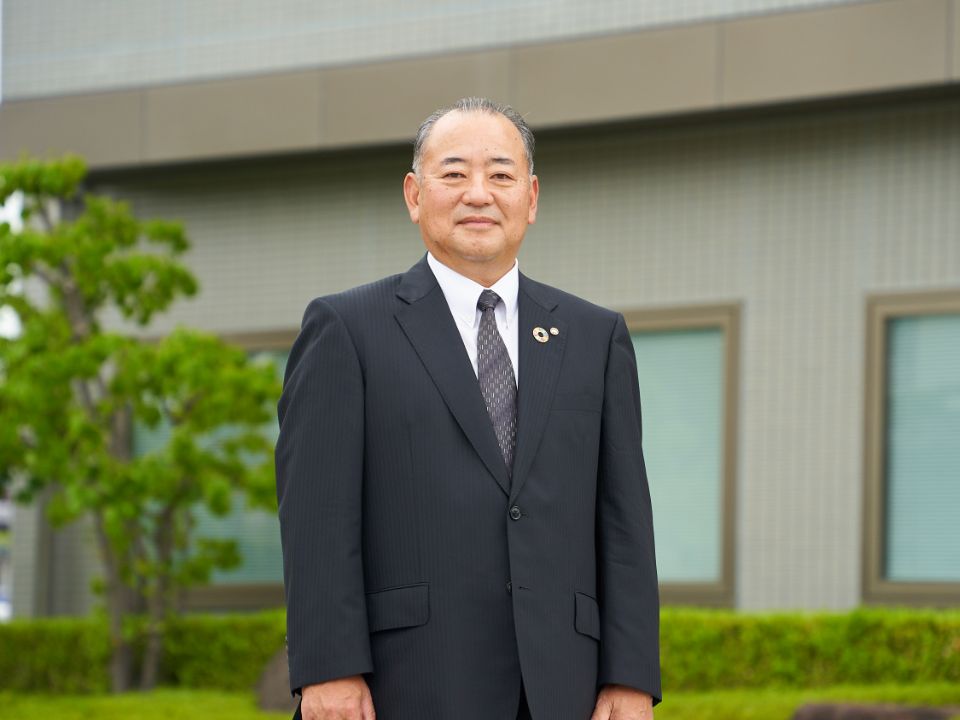 八巻恵一